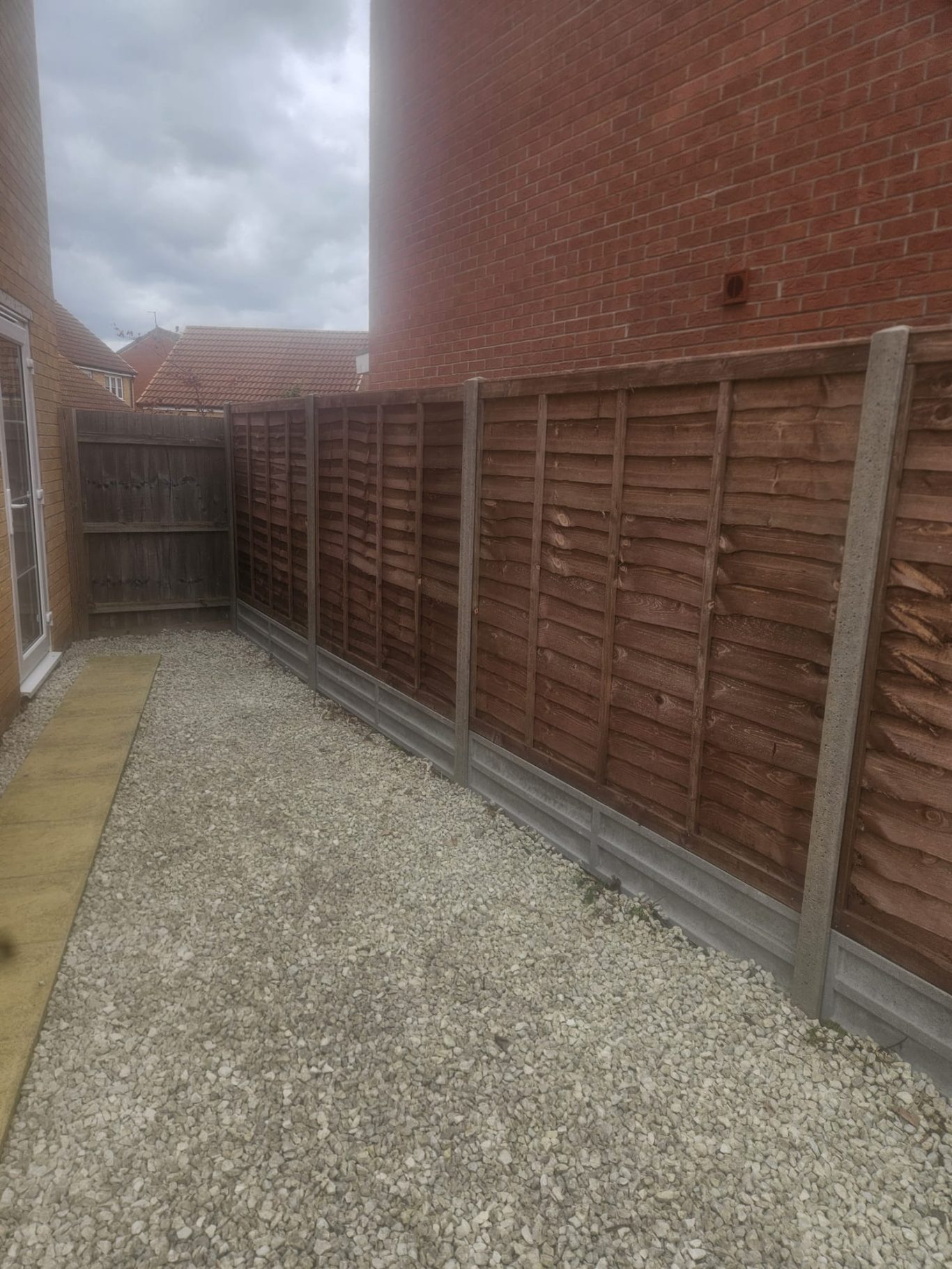 Fence Installation with Concrete in Peterborough Panel Fencing with Concrete Posts and Gravel Boards installed in Peterborough
